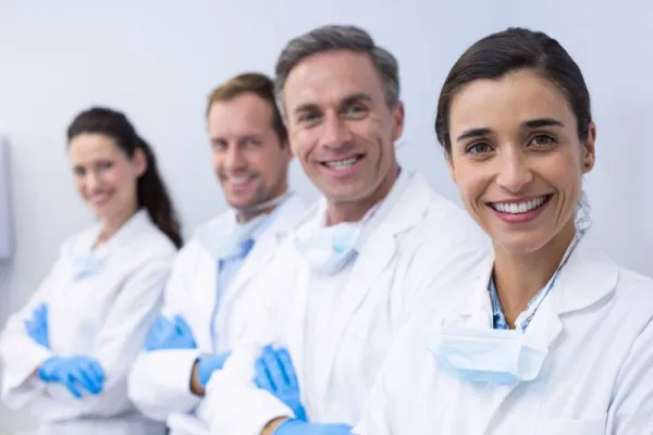 smiling-dentists-standing-with-arms-crossed-2026-01-09-11-30-33-utc1-696615731841e